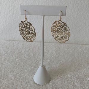 Lazer cut earrings.